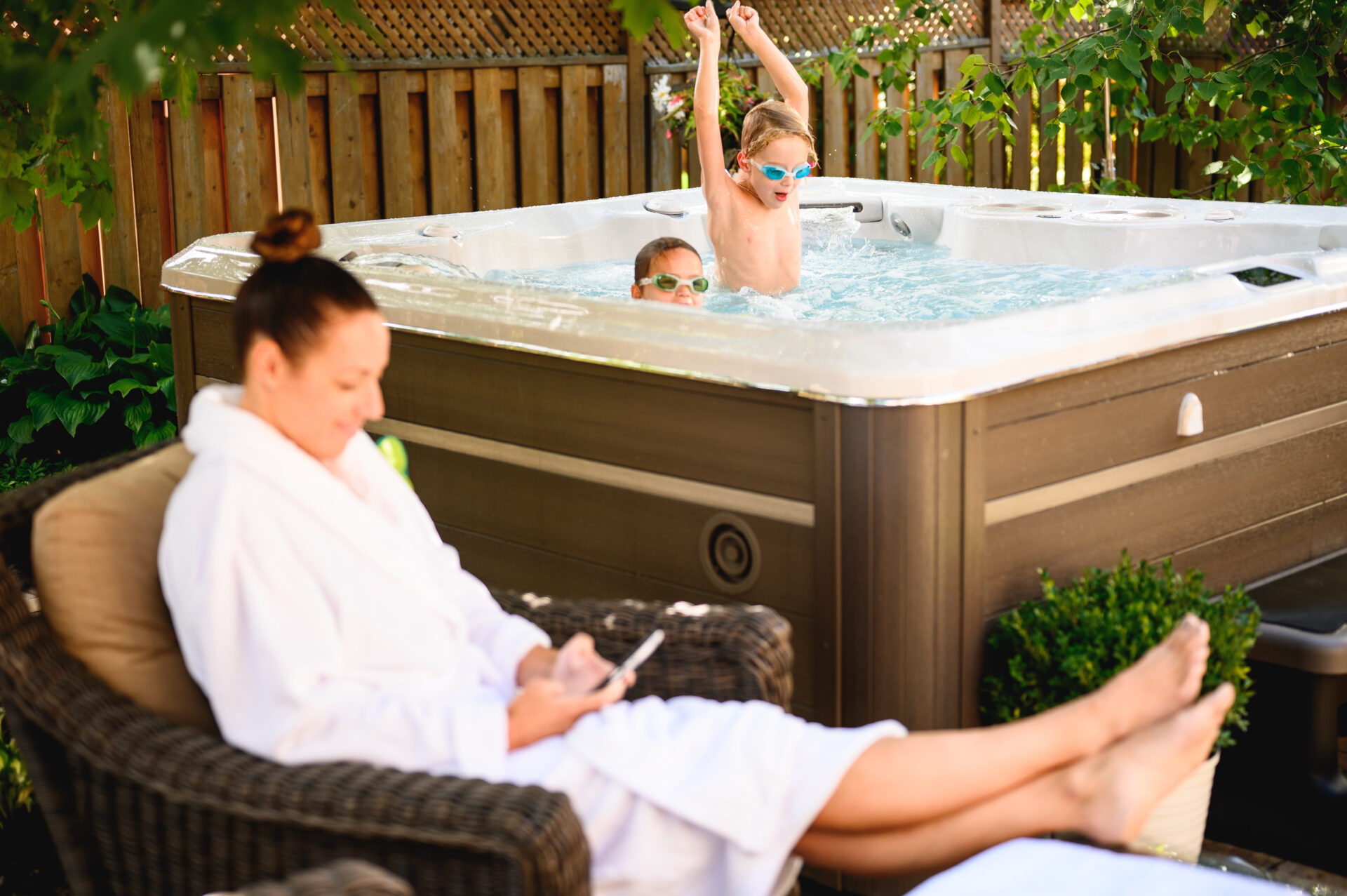 How to Choose Between a Hot Tub and Swim SpaImage